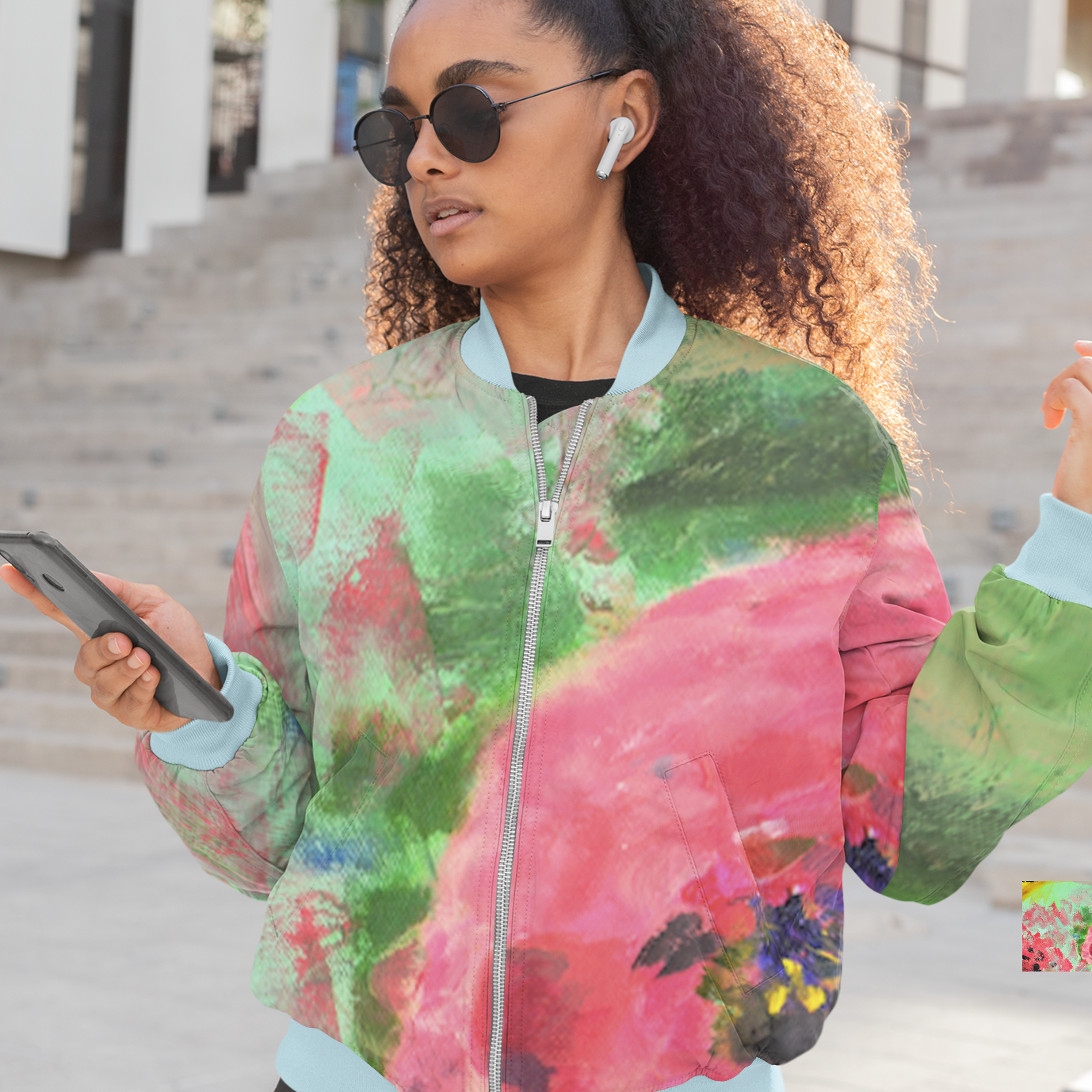 woman wearing floral bomer jacket