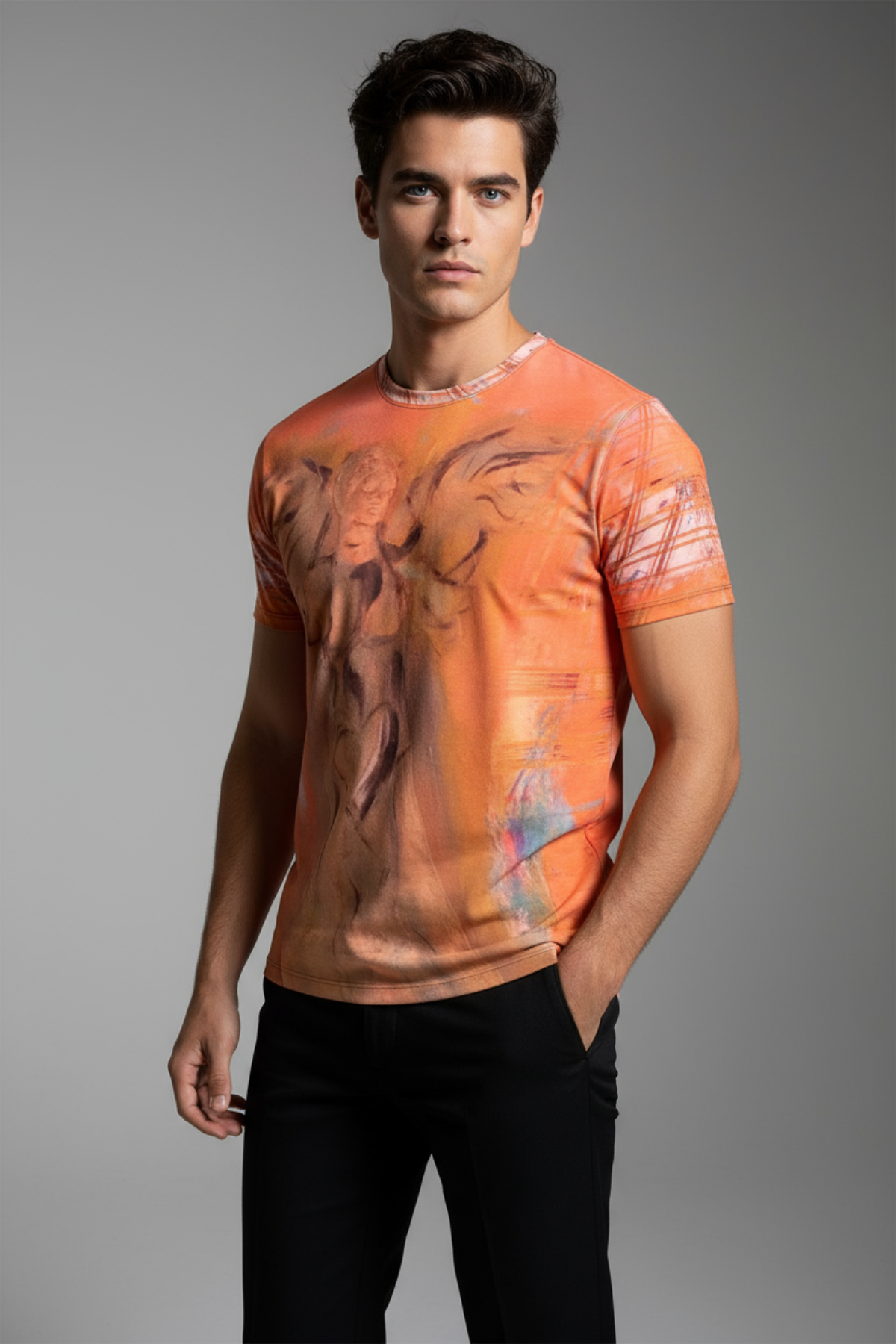 Man wearing an orange t-shirt with graphic design on a gray background