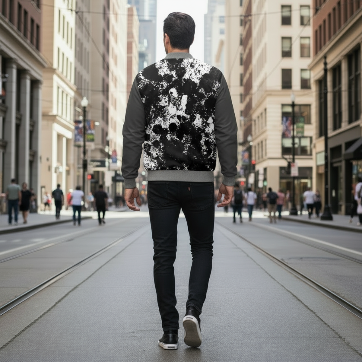 Man walking down a city street wearing a patterned jacket