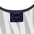FABA label on a white garment with a black strap