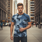 Man wearing a blue camouflage t-shirt on a city street