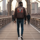 Person walking on the Brooklyn Bridge with city skyline in the background