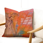 Colorful abstract-patterned pillow on a chair